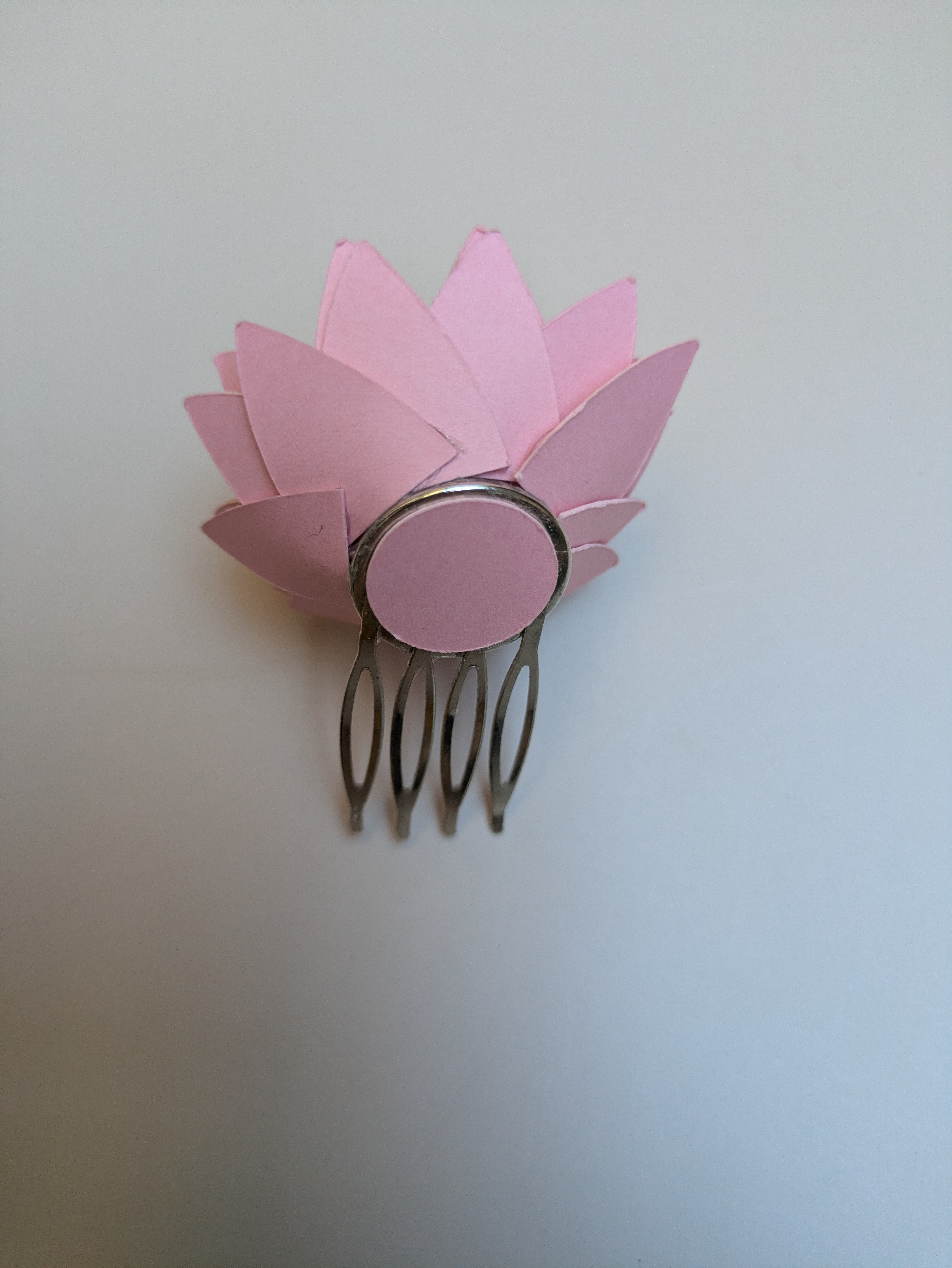 Peigne fleur papier rose pâle 